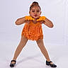 black_shoes, child, dance_costume, fashion, fringe, girl, gloves, happy, orange, performance, playful, portrait, pose, pucker_lips, smile, standing, studio, tights, white_background, young