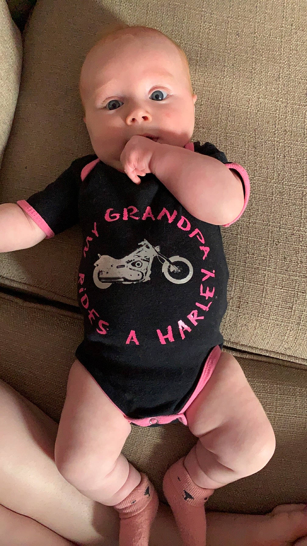 Hadley is registered to the contest to win money with this photo: baby, baby_toddler_clothing, cheek, chest, eye, eyelash, joint, knee, leg, lip, nail, neck, organ, person, pink, skin, sleeve, stomach, thigh, toddler
