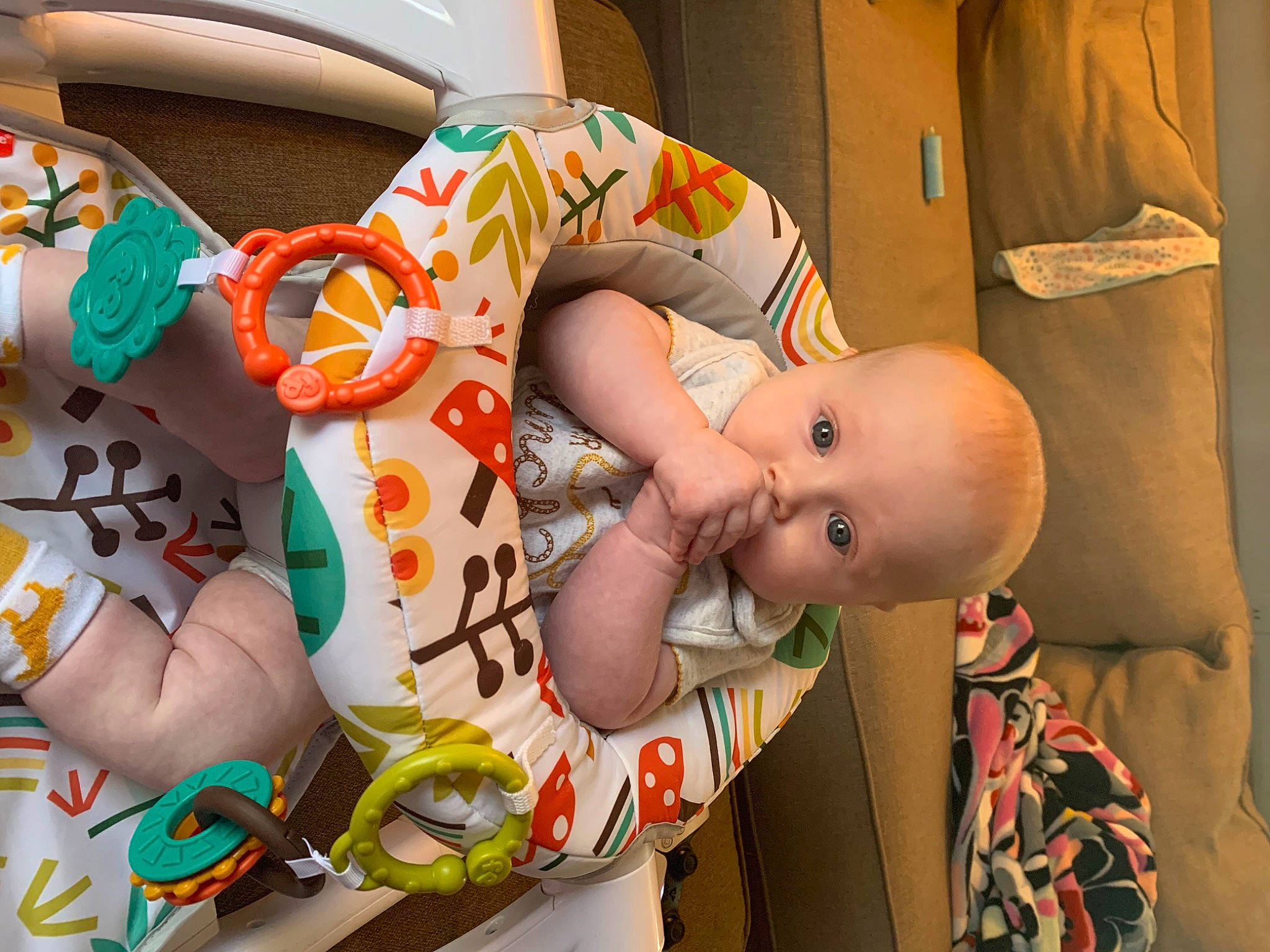 Hadley joined the competition — help win amazing prizes! baby, baby_products, baby_safety, baby_toddler_clothing, baby_toys, child, clothing, comfort, fun, happy, human_body, mouth, orange, people, person, room, sitting, textile, toddler, toy