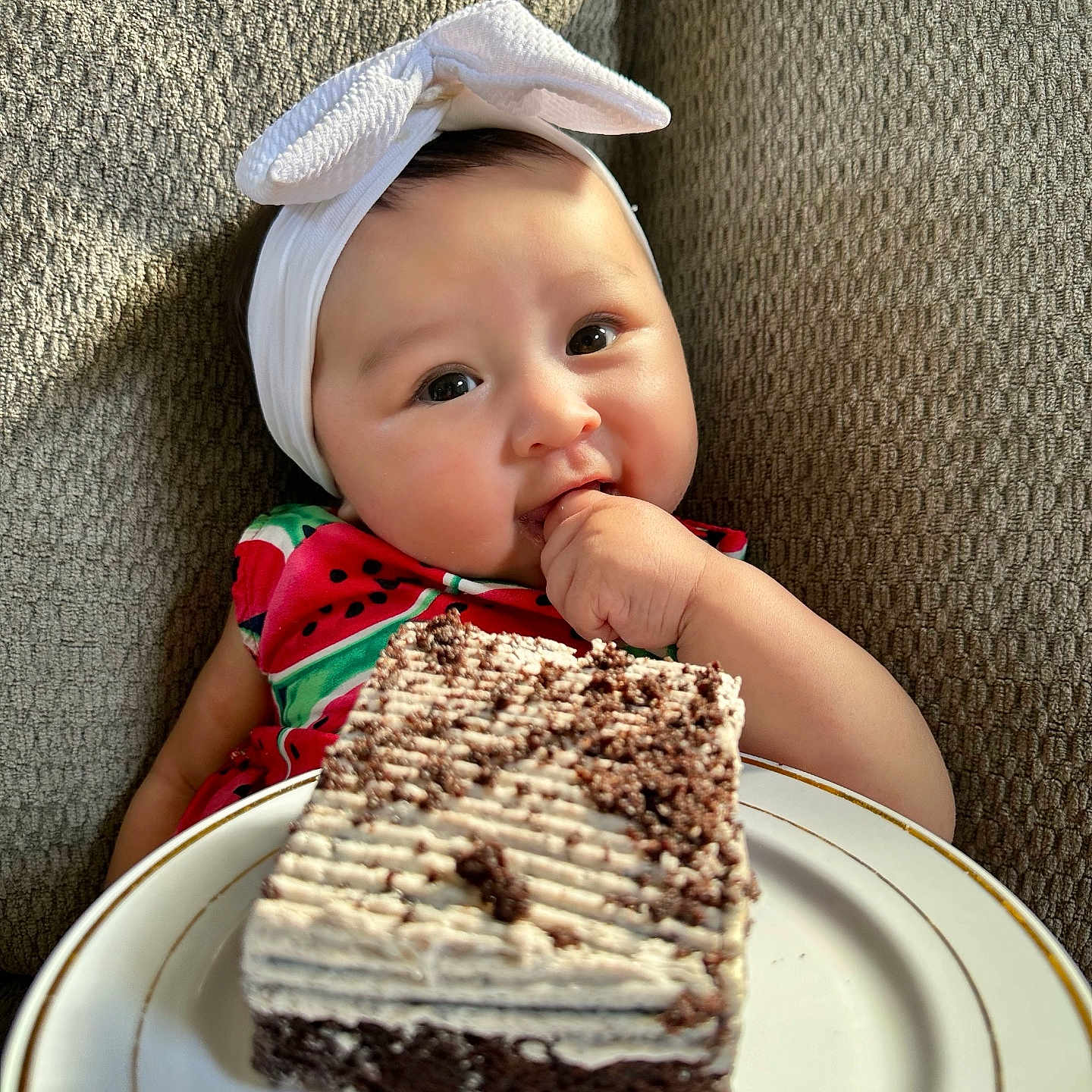 Leia joined the competition — help win amazing prizes! baby, birthdaycake, cake, couch, cream, dessert, dish, eating, face, food, furniture, head, icecream, icing, meal, people, person, photography, plate, portrait