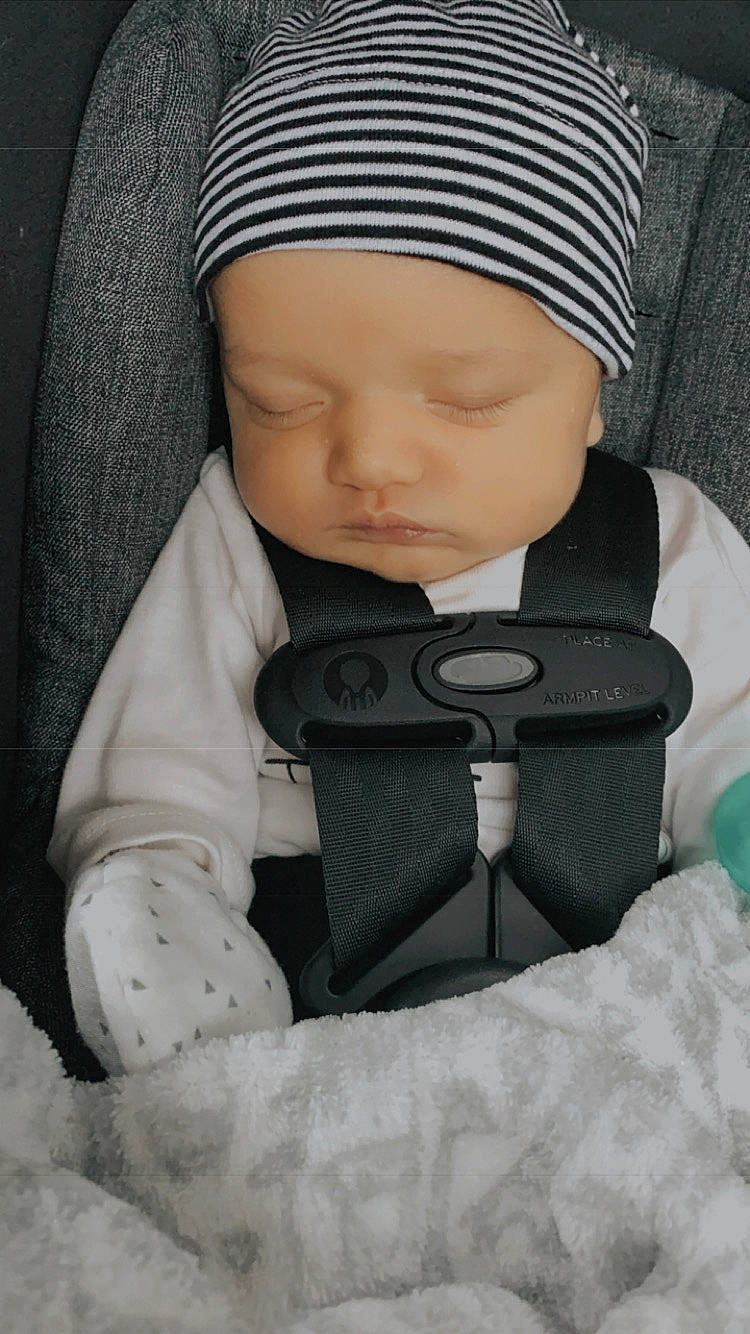 Grayson is registered to the contest to win money with this photo: baby, baby_carriage, baby_products, child, headwear, person, toddler