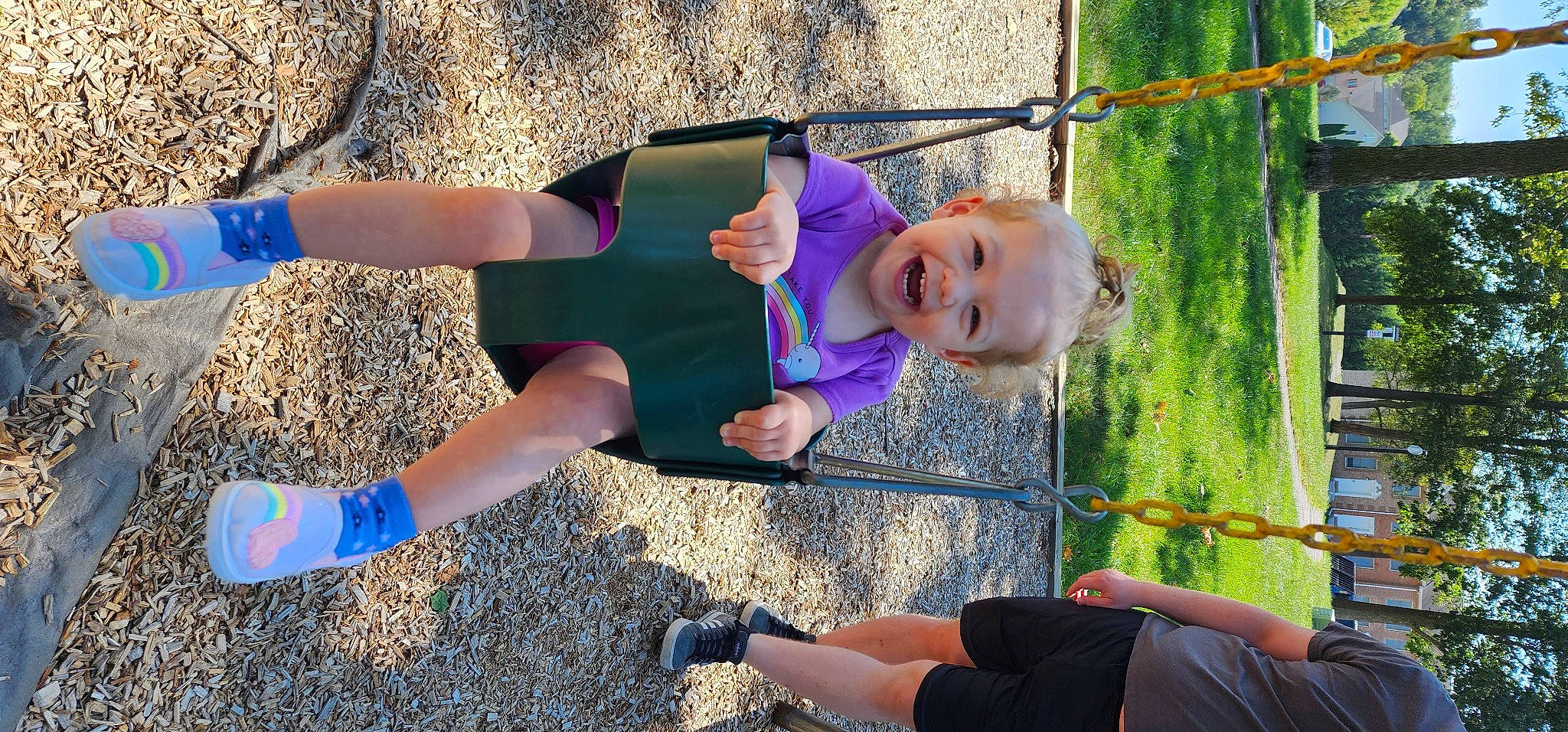 Annelie joined the competition — help win amazing prizes! baby, blue, child, electric_blue, facial_expression, fun, grass, happy, leg, leisure, people_in_nature, person, plant, recreation, shorts, smile, sneakers, thigh, toddler, tree