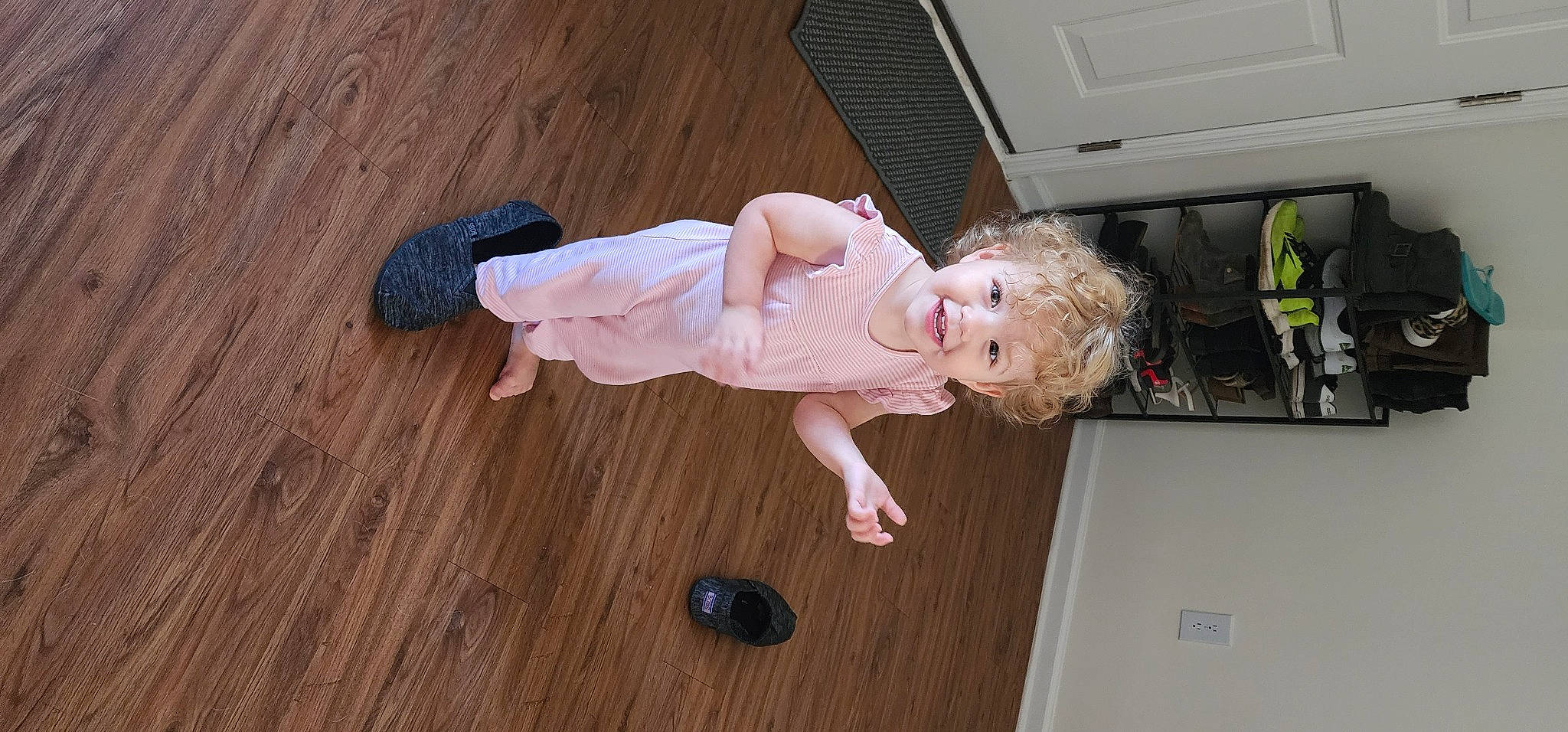 Annelie is registered to the contest to win money with this photo: baby, baby_products, baby_toddler_clothing, child, flooring, foot, fun, hardwood, human_leg, joy, knee, laminate_flooring, person, room, smile, sock, thumb, toddler, varnish, wood