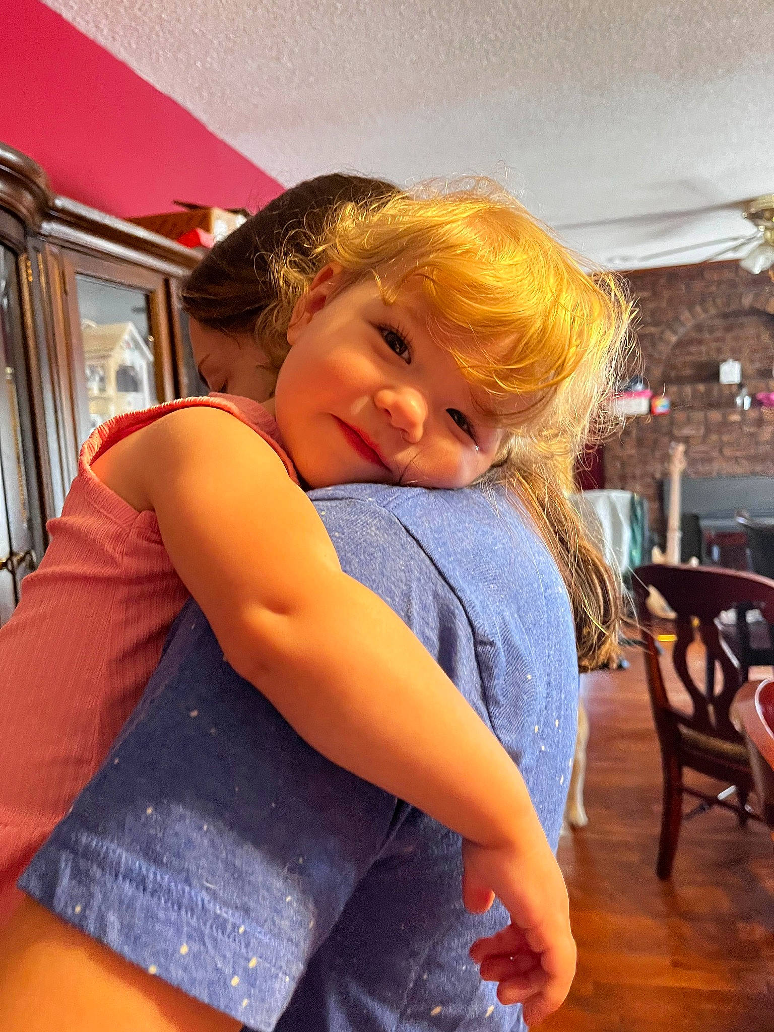 Janelle joined the competition — help win amazing prizes! blond, brown_hair, chair, child, denim, electric_blue, flooring, fun, happy, hardwood, human_leg, leisure, orange, person, sitting, smile, thigh, toddler, trunk, vacation