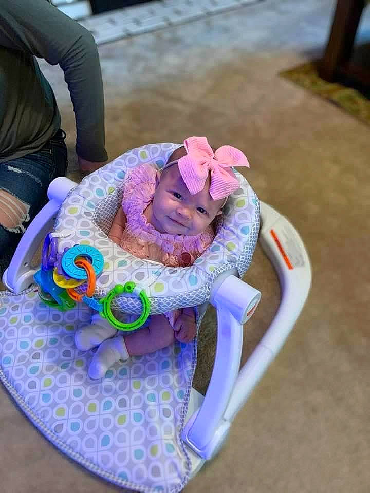 Madalynn is registered to the contest to win money with this photo: cut_flowers, electric_blue, event, fashion_accessory, floral_design, flower, flower_arranging, grass, hair_accessory, hat, headpiece, headwear, magenta, person, petal, pink, plant, purple, rose, stuffed_toy