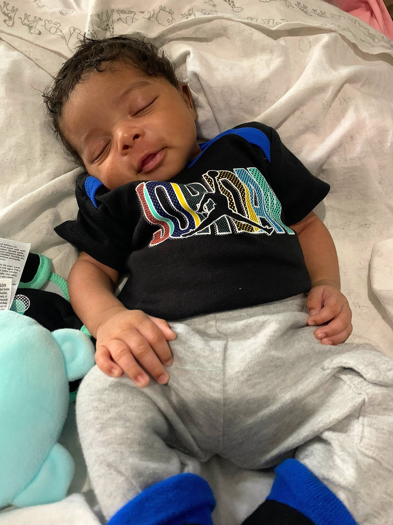 Deshawn joined the competition — help win amazing prizes! arm, baby_toddler_clothing, blue, comfort, cool, couch, eye, hair, hairstyle, head, human_body, jeans, mouth, person, product, skin, sleeve, t_shirt, textile, thigh