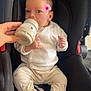 Derine participe au concours pour gagner de l'argent avec cette photo : baby, bottle, car_seat, child, clothing, cute, face, feeding, floral_pants, hand, indoors, infant, person, pink_flower, portrait, seatbelt, shoes, sitting, small, white_sweater