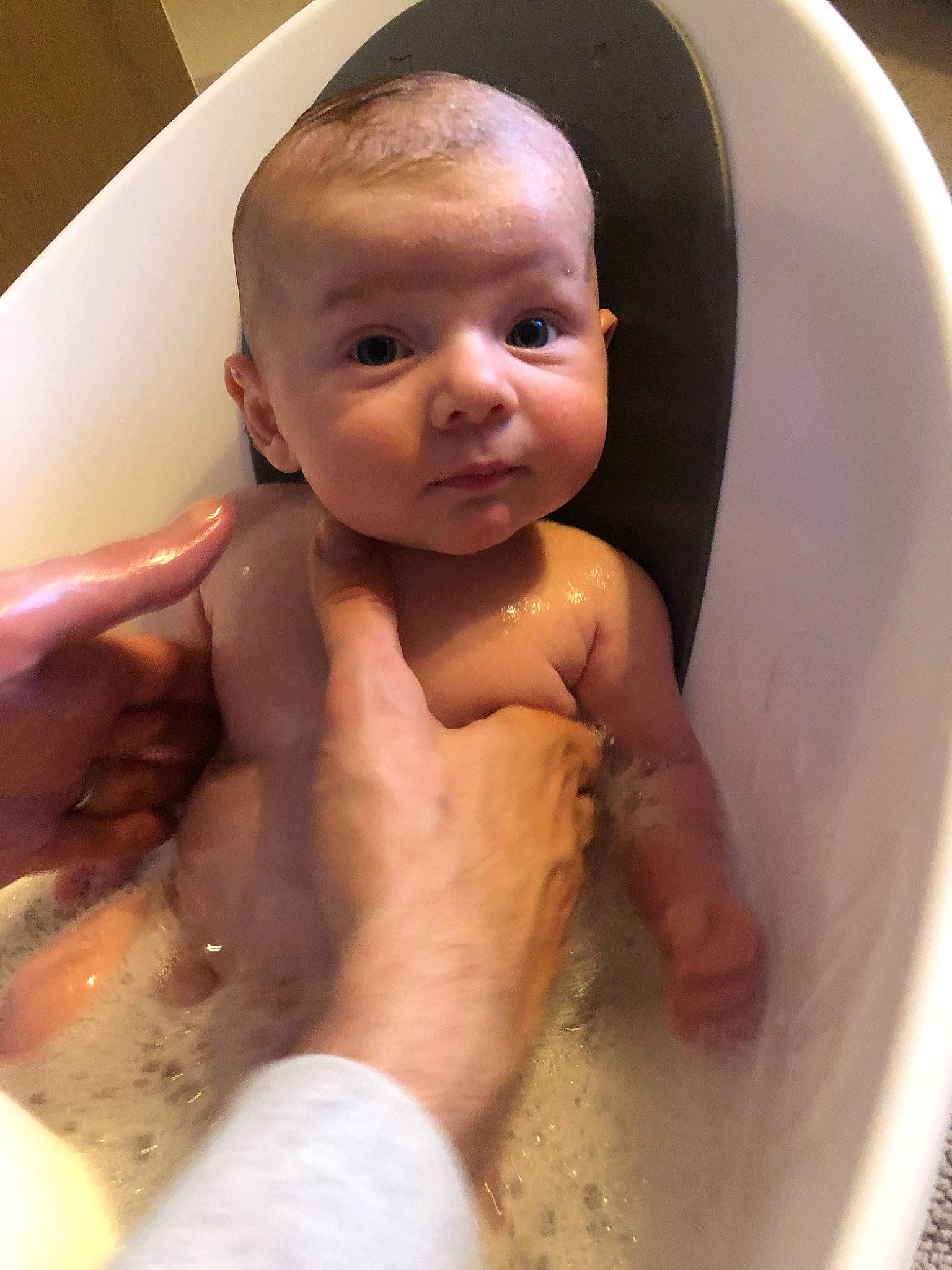 Alfred is registered to the contest to win money with this photo: baby, baby_bathing, bathing, bathtub, cheek, child, eye, face, head, muscle, person, skin, smile, toddler, washing