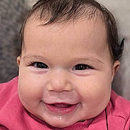 Nayla joined the competition — help win amazing prizes! baby, child, infant, smiling, happy, portrait, close_up, face, eyes, bow, hair, pink_clothing, sweater, indoors, candid, looking_at_camera, cheeks, mouth, cute, photography