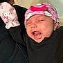 Aliana joined the competition — help win amazing prizes! baby, infant, person, child, hat, gloves, pink, hello_kitty, mittens, clothing, black_clothing, expression, face, mouth_open, indoor, holding, cute, adorable, skin, headwear