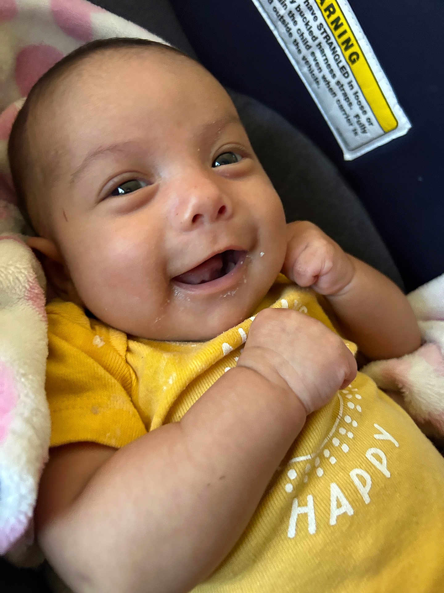 Aliana joined the competition — help win amazing prizes! baby, smiling, yellow_shirt, happy, blanket, fist, infant, face, closeup, cute, child, expression, indoors, person, skin, clothing, newborn, joyful, warning_label, soft_texture