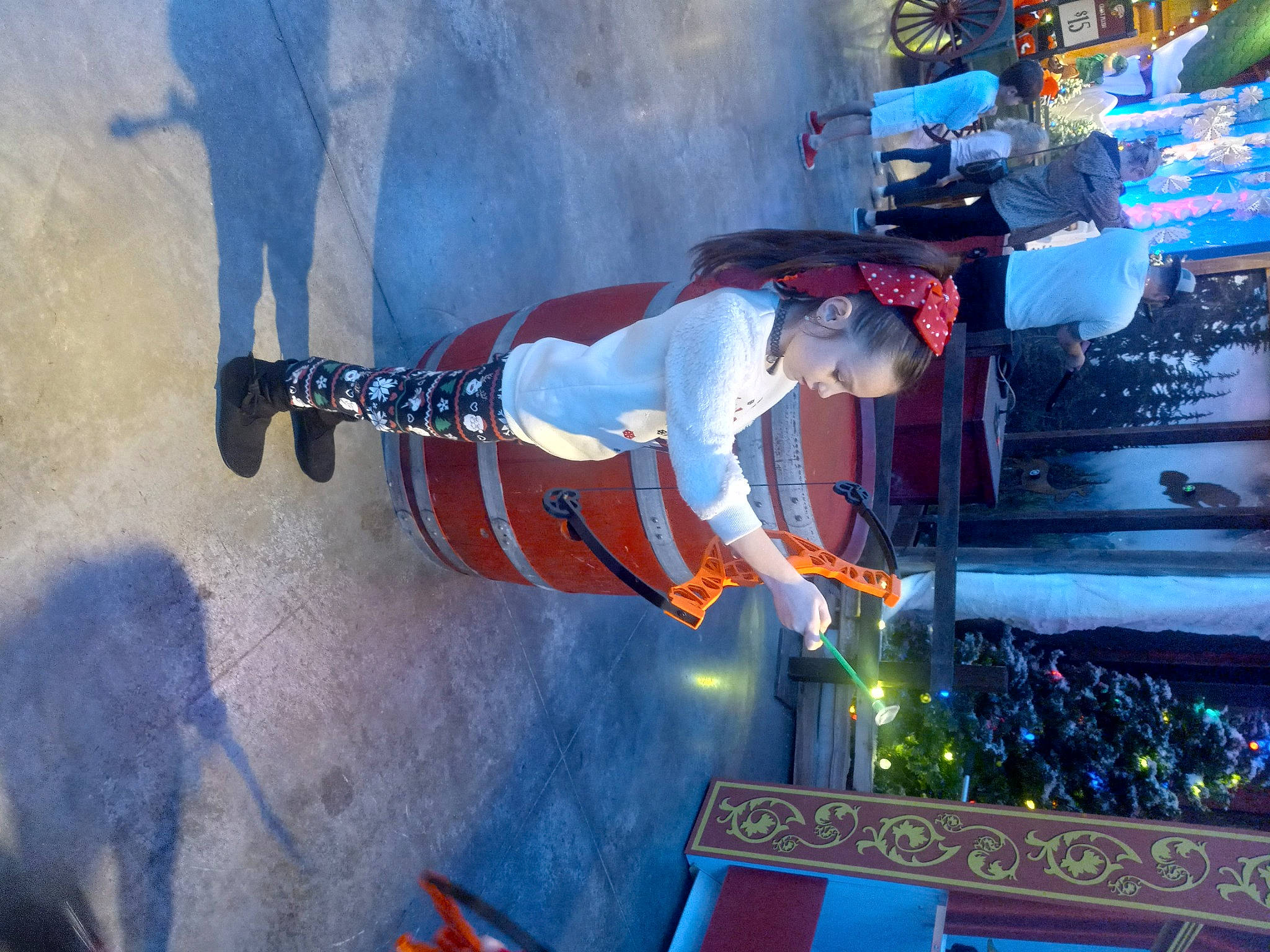 Breelyn is registered to the contest to win money with this photo: art, blue, carmine, electric_blue, event, fictional_character, fun, leisure, person, sky, tradition, tree, winter, world