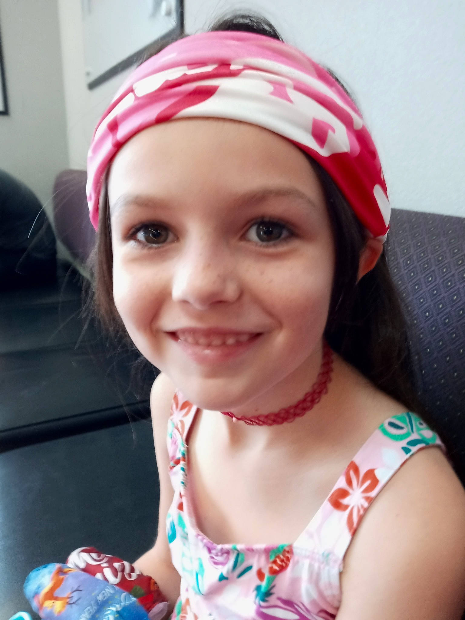 Breelyn joined the competition — help win amazing prizes! blue, cap, child, clothing, ear, eyebrow, eyelash, fun, happy, headband, headwear, joy, lip, magenta, mouth, neck, nose, person, personal_protective_equipment, pink