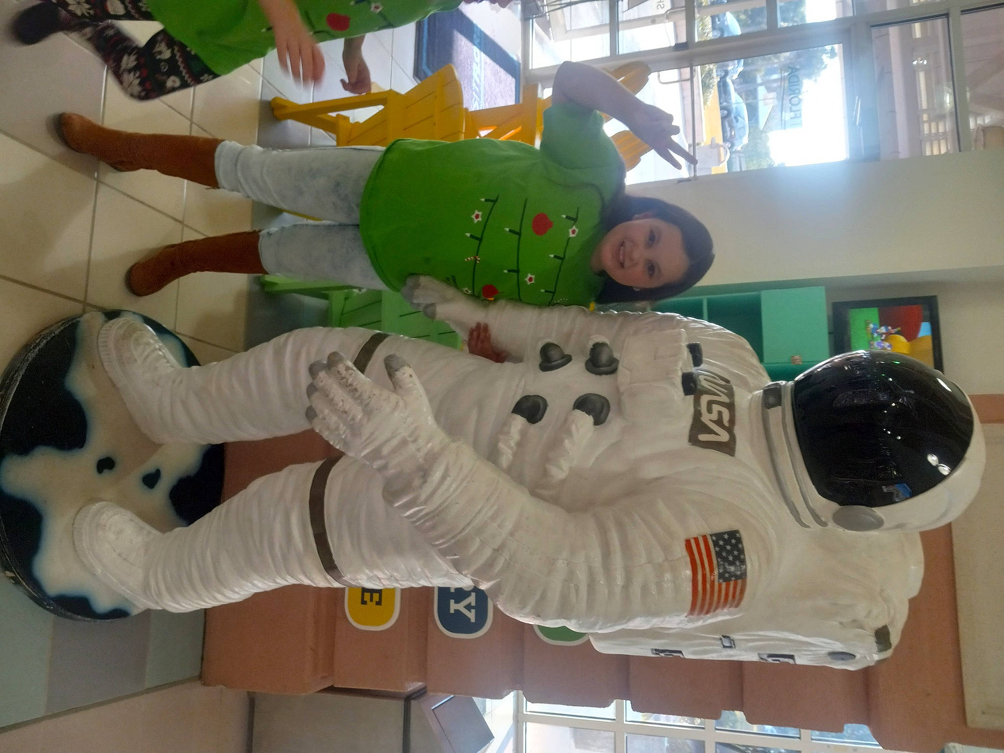 Baylee joined the competition — help win amazing prizes! carmine, engineering, flooring, fun, joy, machine, mammal, mascot, person, recreation, room, space, sports_uniform, window, world