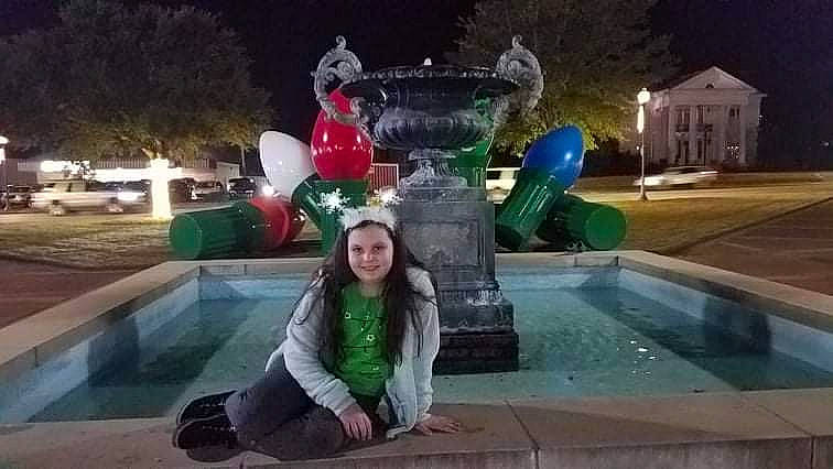 Baylee is registered to the contest to win money with this photo: art, city, fountain, fun, garden, grass, green, happy, joy, landscape, lawn_ornament, leisure, person, plant, recreation, sculpture, statue, travel, tree, water