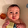 baby, bath, child, chubby_cheeks, closeup, cute, expression, face, hands, holding, indoor, infant, playful, portrait, rubber_duck, skin, soft_light, toy, water, young