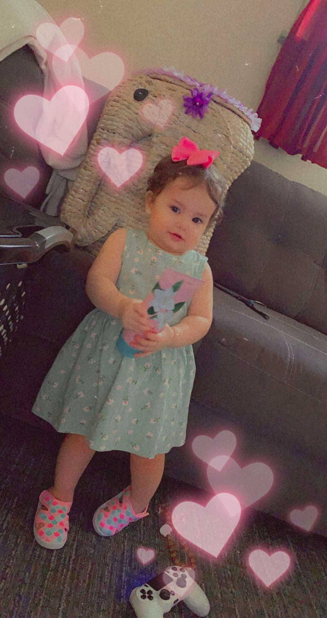 Jaylani joined the competition — help win amazing prizes! baby_toddler_clothing, child, couch, dress, flooring, fun, hairstyle, happy, leg, magenta, organ, pattern, person, pink, product, purple, skin, standing, textile, toddler