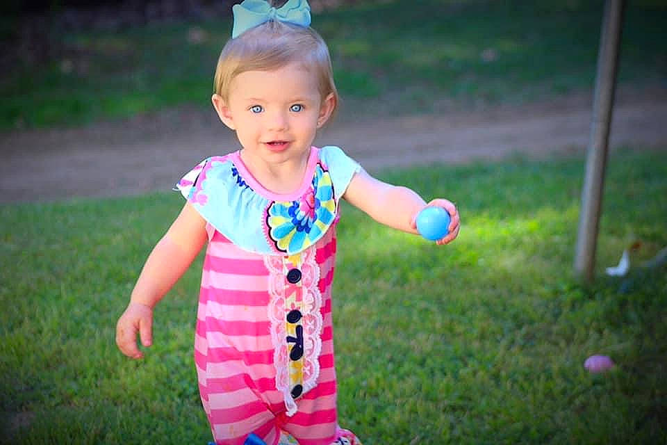 Shannon is registered to the contest to win money with this photo: baby, baby_toddler_clothing, child, grass, happy, person, pink, play, toddler