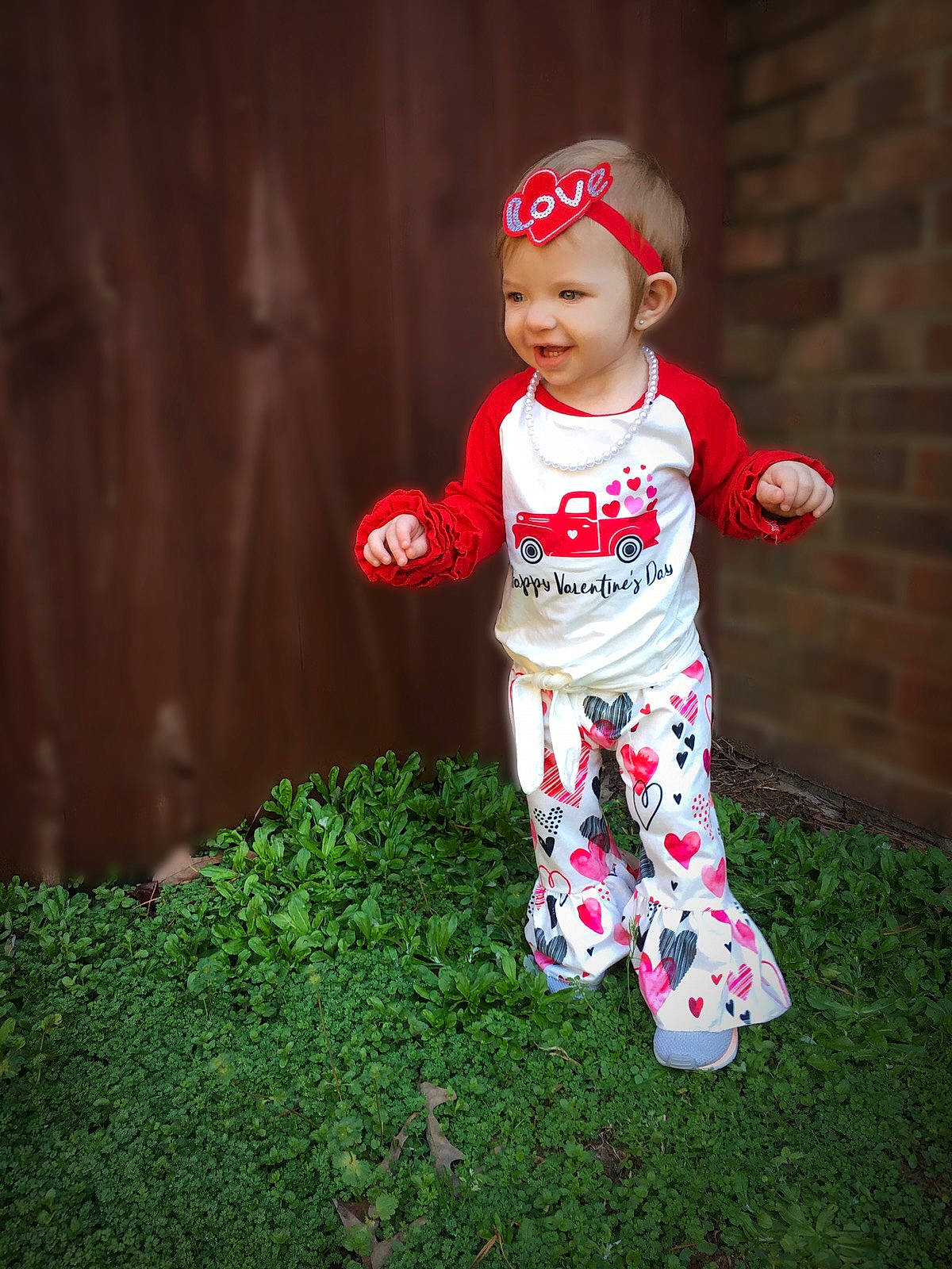Blakelee joined the competition — help win amazing prizes! baby, baby_toddler_clothing, cap, child, grass, headgear, headwear, joy, person, pink, play, red, toddler