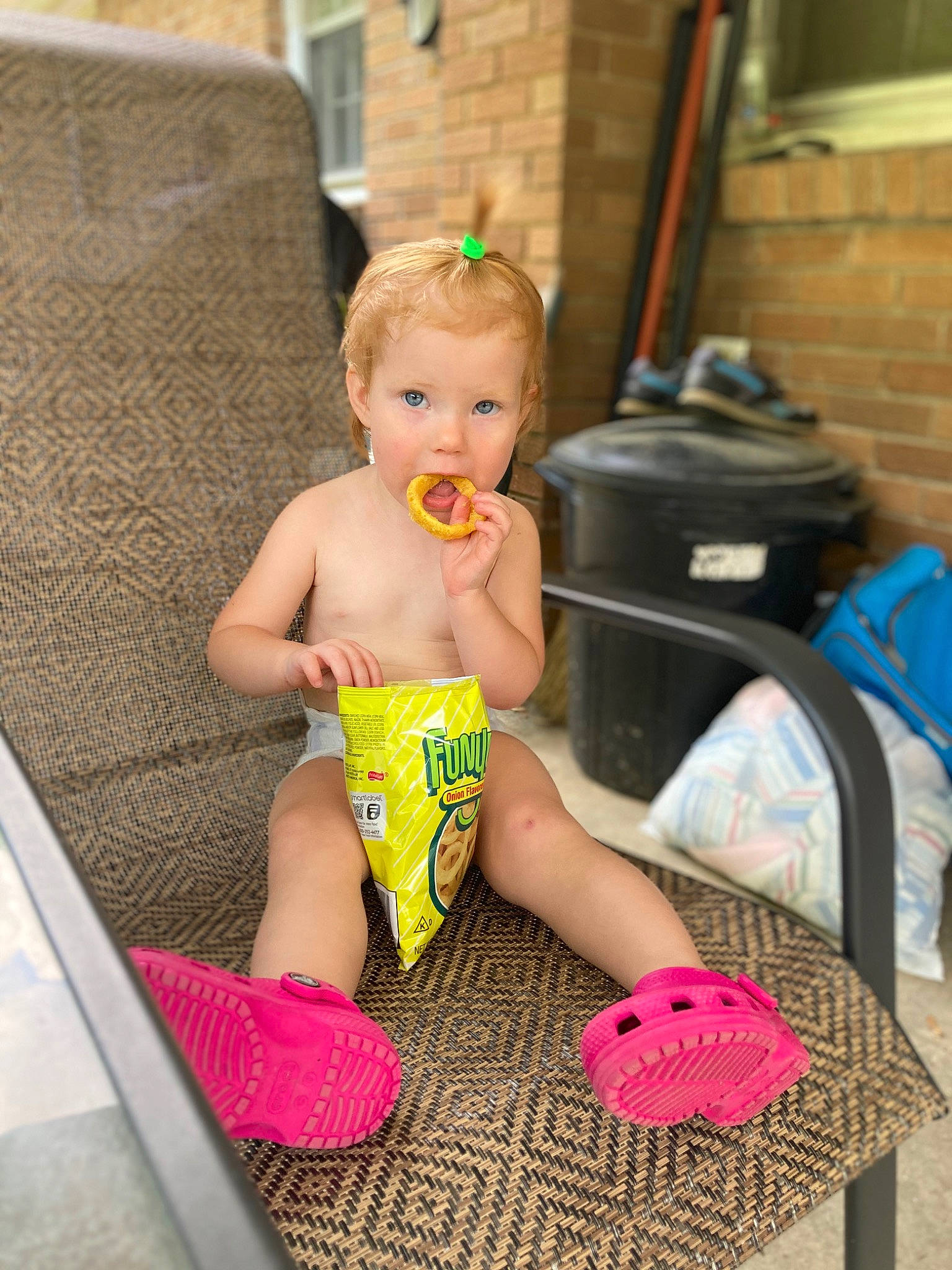 Jazlyn is registered to the contest to win money with this photo: baby, baby_products, baby_toddler_clothing, blond, chair, child, fashion_accessory, floor, flooring, foot, fun, happy, human_leg, leisure, person, pink, room, sandal, sitting, thigh