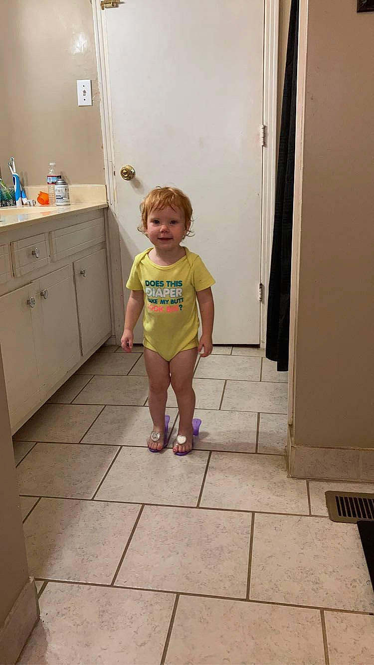 Jazlyn joined the competition — help win amazing prizes! baby_toddler_clothing, cabinetry, child, drawer, face, floor, flooring, fun, hair, hardwood, head, human_leg, joy, knee, leg, person, smile, thigh, toddler, trunk