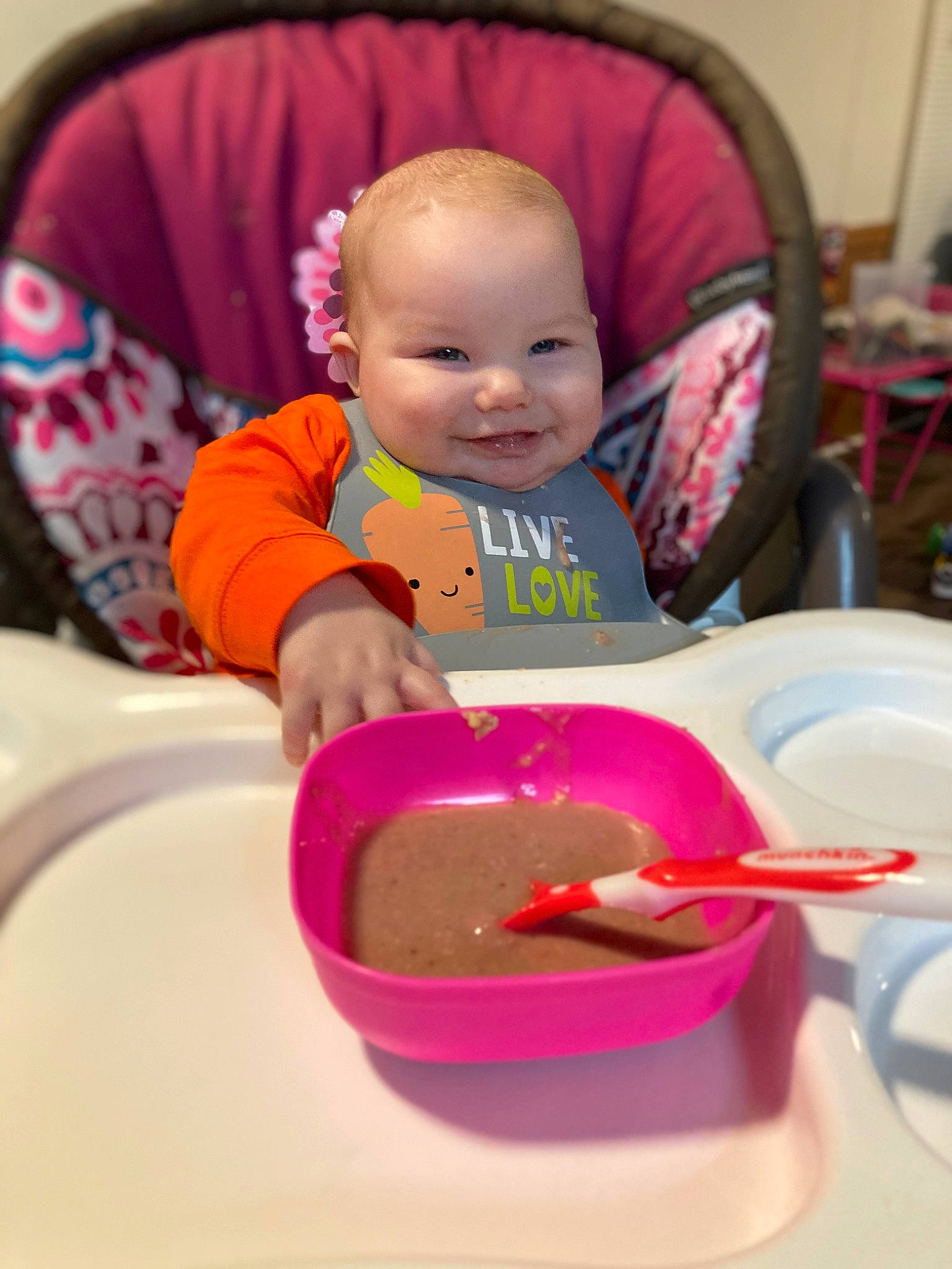 Ryland Kayde joined the competition — help win amazing prizes! baby, baby_toddler_clothing, chair, cheek, child, comfort, comfort_food, drinkware, fun, happy, head, joy, orange, person, pink, plate, purple, serveware, sitting, smile