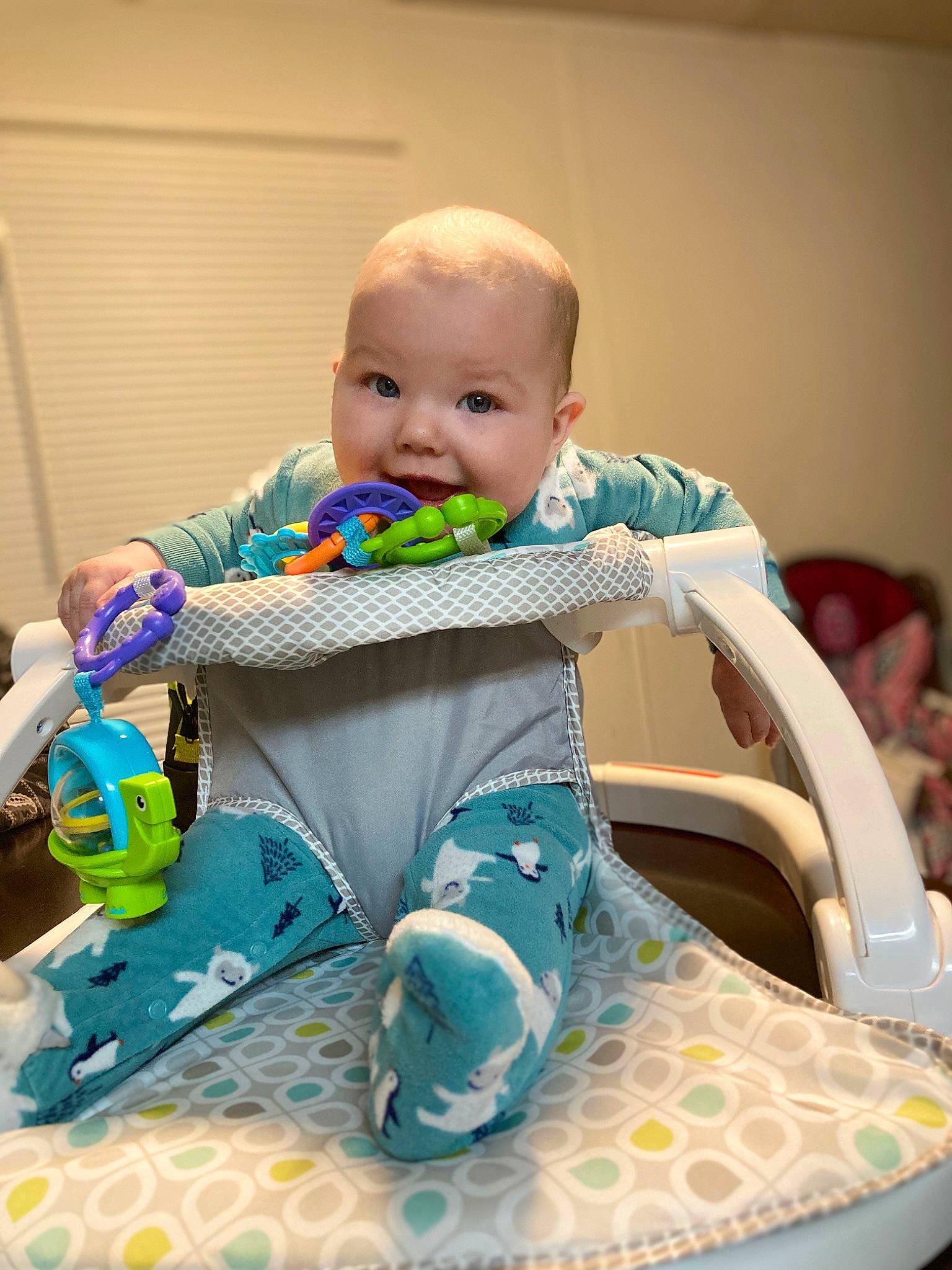 Ryland Kayde is registered to the contest to win money with this photo: baby, baby_products, baby_safety, baby_toddler_clothing, baby_toys, bib, child, comfort, event, fashion_design, fun, happy, pattern, person, play, sitting, skin, sleeve, smile, t_shirt
