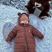 Gabriel participe au concours pour gagner de l'argent avec cette photo : baby, beanie, child, cold_weather, cute, footwear, grass, happy, infant, milestone_sign, nature, outdoor, play, smiling, snow, snow_angel, snowsuit, teddy_bear, toy, winter_clothing