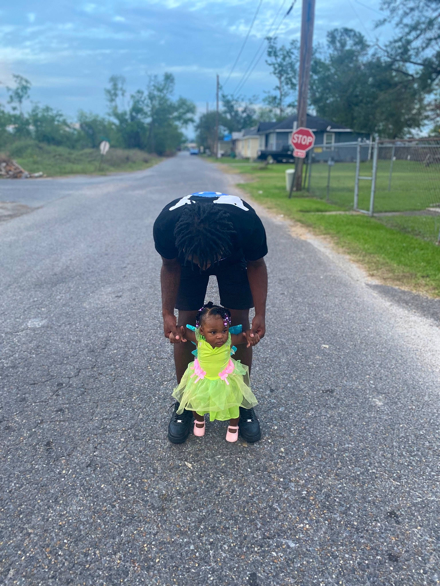 Honesty is registered to the contest to win money with this photo: asphalt, baby, cloud, grass, infrastructure, landscape, leisure, people_in_nature, person, plant, recreation, road, road_surface, sidewalk, sky, tar, thoroughfare, toddler, tree, wheel