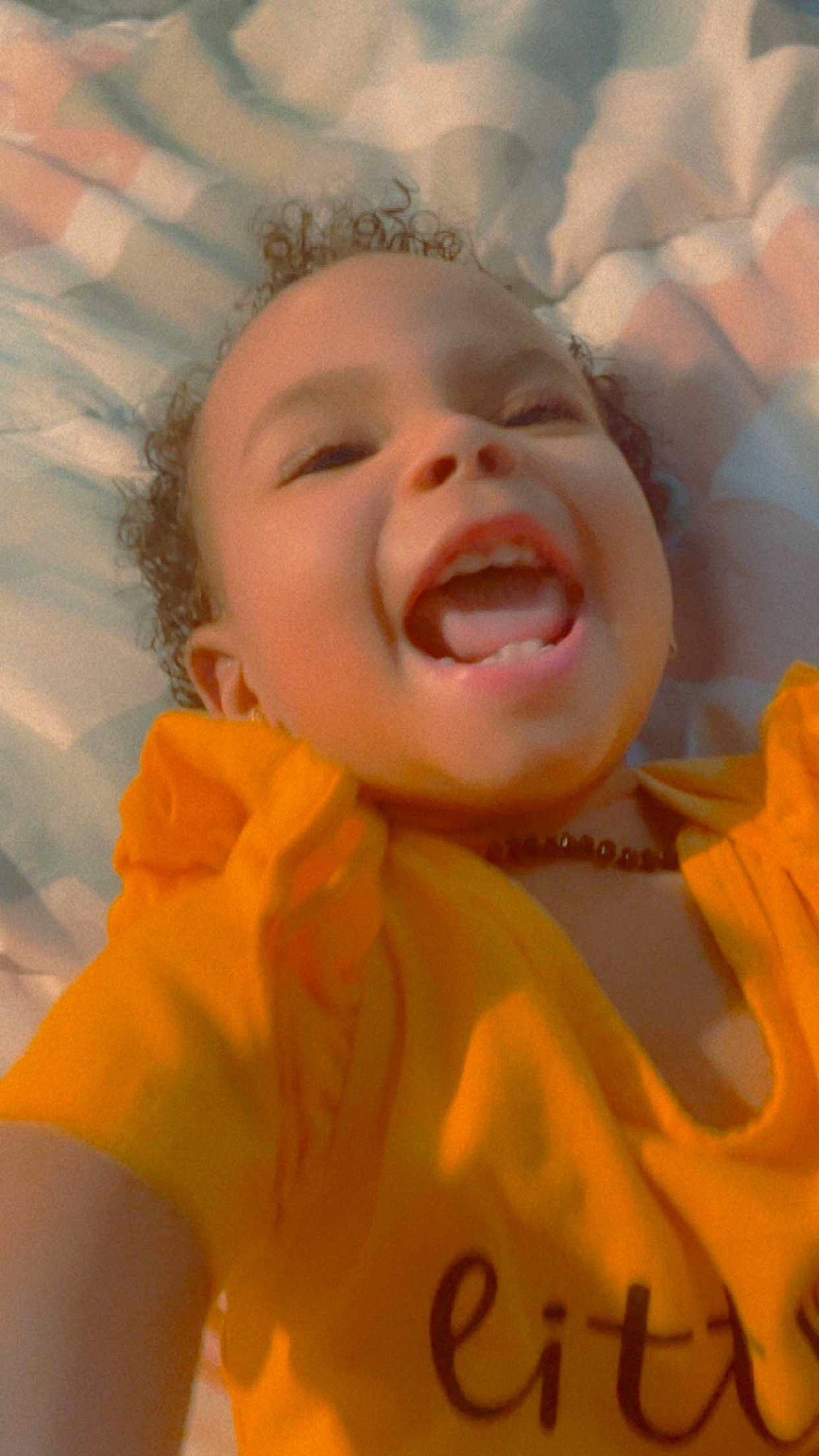 Zaleah joined the competition — help win amazing prizes! baby, cheek, child, chin, close_up, eyebrow, face, fun, gesture, grass, happy, leisure, lip, mouth, nose, orange, people_in_nature, person, smile, toddler