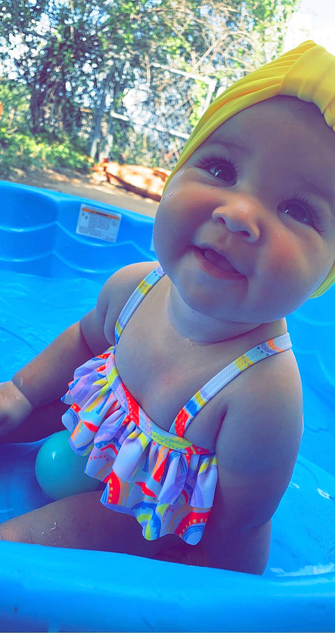 Paisley joined the competition — help win amazing prizes! aqua, azure, baby, baby_toddler_clothing, chest, child, electric_blue, fun, grass, happy, leisure, nonbuilding_structure, person, play, recreation, skin, smile, swimming_pool, swimwear, thigh