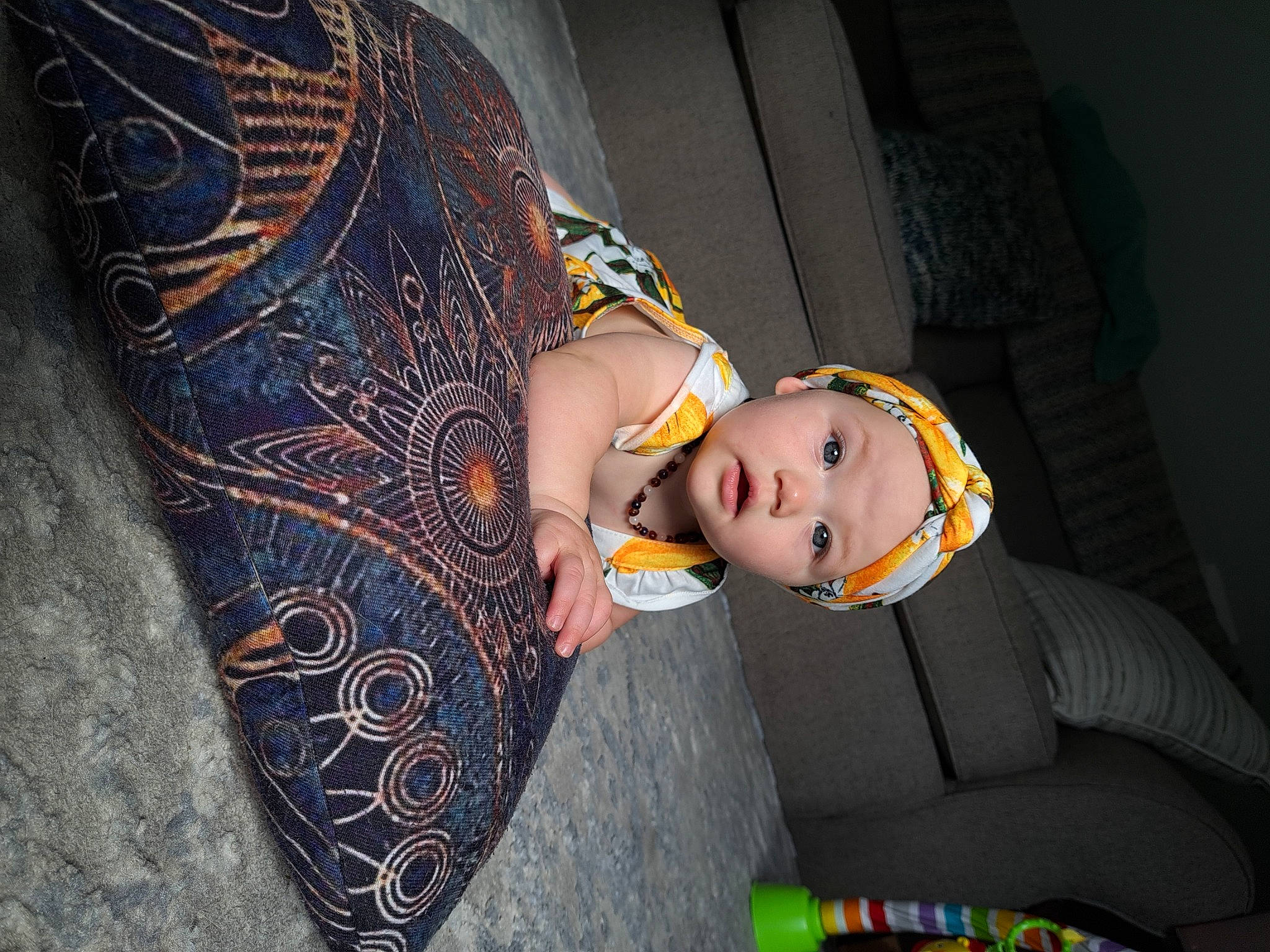 Ireana joined the competition — help win amazing prizes! baby, baby_toddler_clothing, chair, child, comfort, elbow, fashion, fashion_accessory, flash_photography, flooring, fun, headwear, human_leg, pattern, person, personal_protective_equipment, room, sitting, surprise, textile