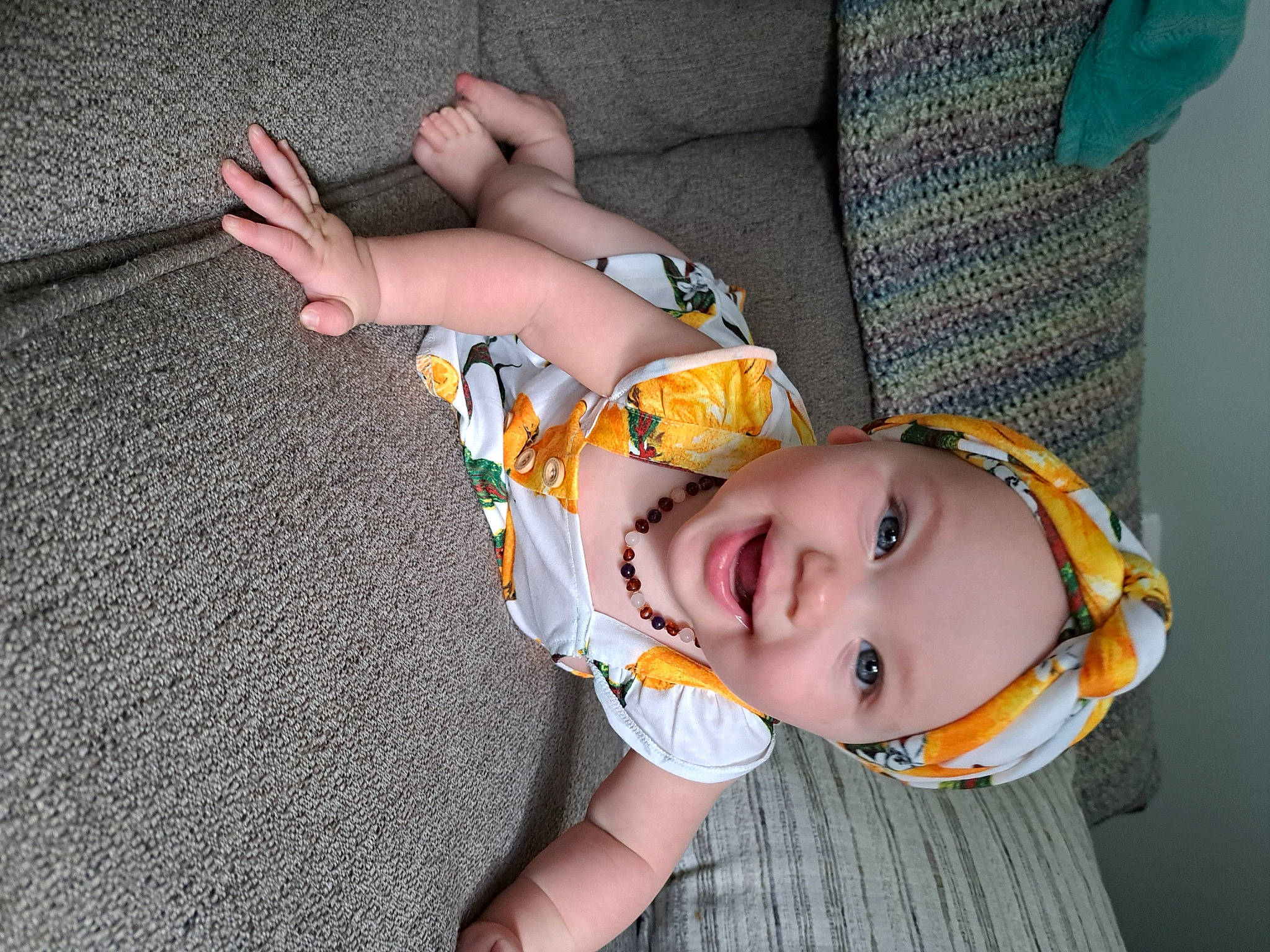 Ireana joined the competition — help win amazing prizes! baby, baby_products, baby_toddler_clothing, child, comfort, finger, foot, fun, grass, hand, happy, hat, headwear, human_leg, joy, knee, pattern, person, skin, smile