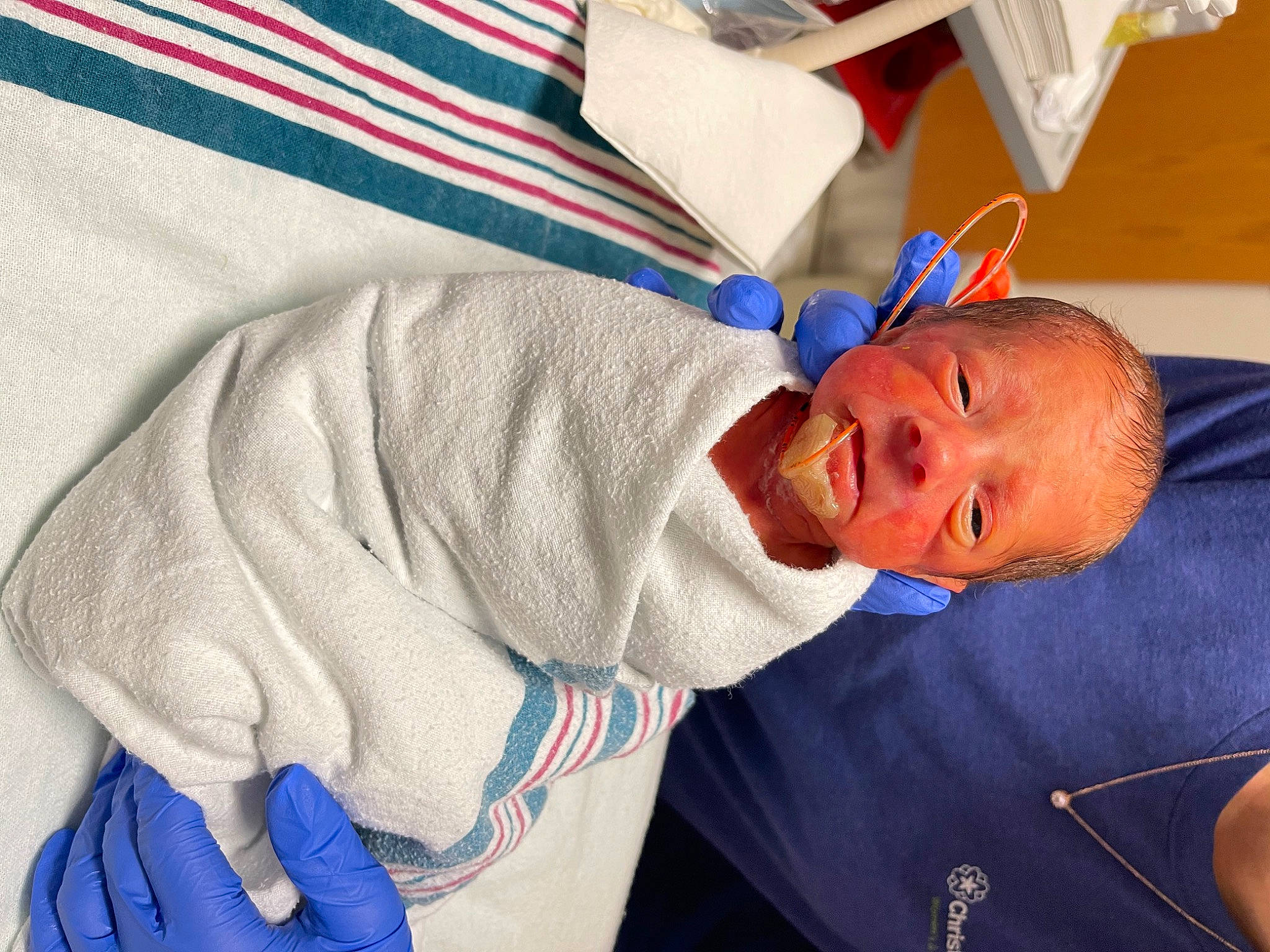 Amelia joined the competition — help win amazing prizes! azure, baby, baby_products, baby_sleeping, baby_toddler_clothing, blue, child, comfort, elbow, electric_blue, hat, hospital, hospital_gown, linens, patient, pattern, person, service, sleeve, sorrow