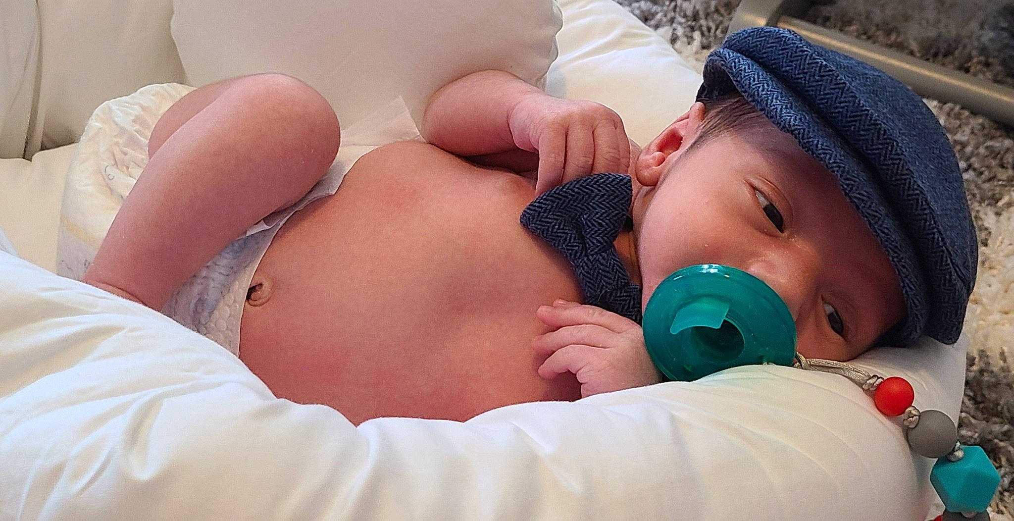 Christopher John is registered to the contest to win money with this photo: abdomen, baby, baby_sleeping, cap, chest, child, comfort, eyelash, finger, happy, headwear, human_leg, interaction, lingerie, nail, person, skin, thigh, thumb, toddler