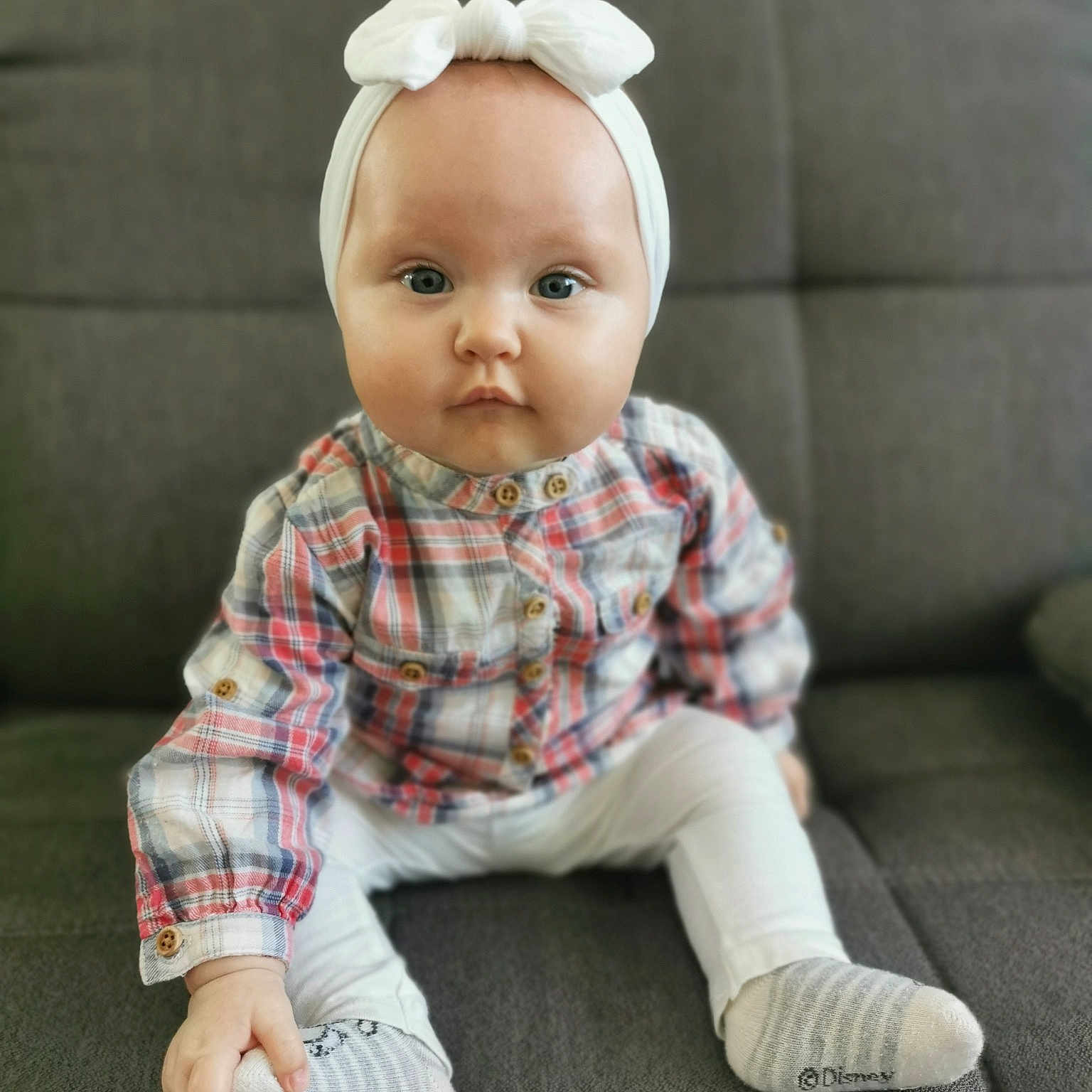 Kelly participe au concours pour gagner de l'argent avec cette photo : baby, baby_toddler_clothing, cheek, child, collar, doll, eye, flooring, fur, lip, pattern, plaid, sitting, skin, sleeve, tartan, toddler, toy, wood, wool