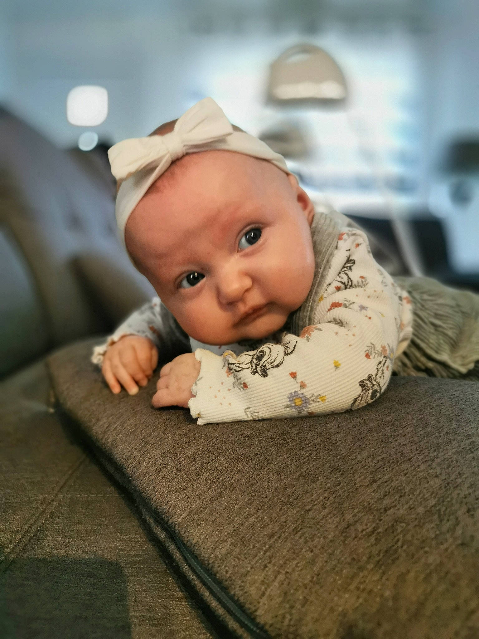 Kelley participe au concours pour gagner de l'argent avec cette photo : baby, baby_toddler_clothing, cheek, child, comfort, fashion_accessory, flash_photography, flooring, fun, fur, happy, linens, person, portrait_photography, room, sitting, sleeve, toddler, wood, wool