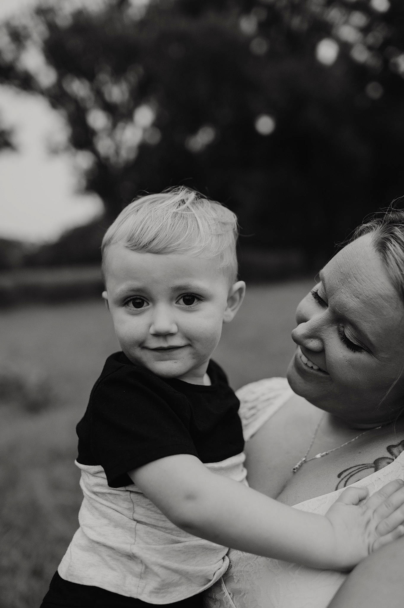 Anthony Jameson joined the competition — help win amazing prizes! black_and_white, child, flash_photography, fun, gesture, grass, happy, iris, joy, monochrome, monochrome_photography, people, people_in_nature, person, plant, skin, smile, standing, style, toddler