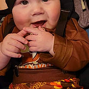 George joined the competition — help win amazing prizes! baby, child, beanie, hat, smile, hands, brown_clothing, turkey_pattern, festive, cute, chubby_cheeks, indoors, person, infant, happy, playful, young, clothing, warm, portrait