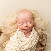 Westin joined the competition — help win amazing prizes! newborn, baby, infant, smile, wrapped, blanket, knit, fur, soft, peaceful, sleepy, cute, portrait, closeup, head, face, skin, resting, warm, cozy