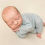 Westin joined the competition — help win amazing prizes! baby, newborn, sleeping, infant, knitted_clothing, soft_texture, peaceful, face, head, hands, feet, portrait, cozy, resting, closeup, cute, child, neutral_background, warm_tones, toddler