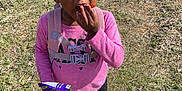 Ivy is registered to the contest to win money with this photo: child, clothing, face, female, food, footwear, girl, grass, head, lawn, nature, outdoors, park, person, photography, plant, portrait, shoe, sweets, t_shirt