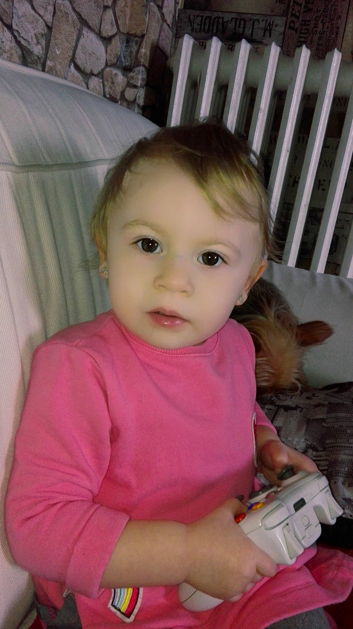 Estrella participe au concours pour gagner de l'argent avec cette photo : cheek, child, day, eye, face, fun, girl, head, human_hair_color, infant, iris, mouth, nose, person, pink, product, sitting, skin, smile, textile