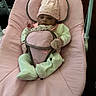 Ka Lani joined the competition — help win amazing prizes! baby, infant, pink, baby_rocker, clothing, hat, mittens, footwear, baby_bouncer, face, person, indoor, cushion, seated, newborn, cute, child, soft, resting, cozy