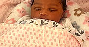 Ka Lani is registered to the contest to win money with this photo: baby, newborn, blanket, pink, soft, plush, heart, pillow, sleeping, child, infant, cute, cozy, bed, headwear, face, resting, comfort, warm, person