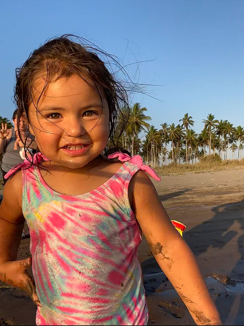 Casey is registered to the contest to win money with this photo: adaptation, beach, beauty, child, eye, face, fun, gesture, happy, joy, leisure, lip, people_in_nature, person, skin, sky, smile, summer, toddler, travel