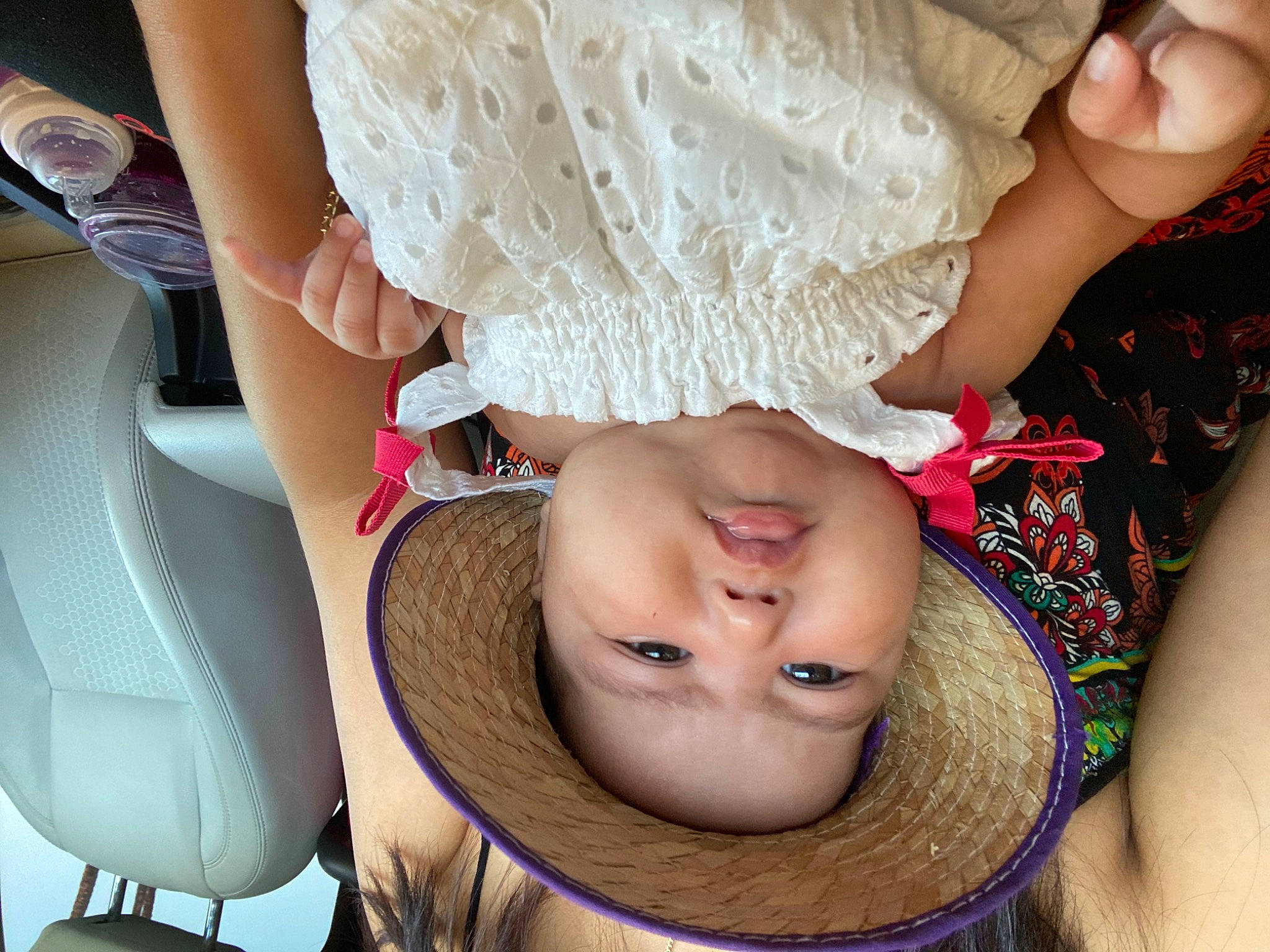 Celine is registered to the contest to win money with this photo: abdomen, baby, chest, comfort, eyelash, facial_expression, finger, fun, gesture, happy, headwear, joint, nail, neck, pattern, person, skin, toddler, trunk, waist