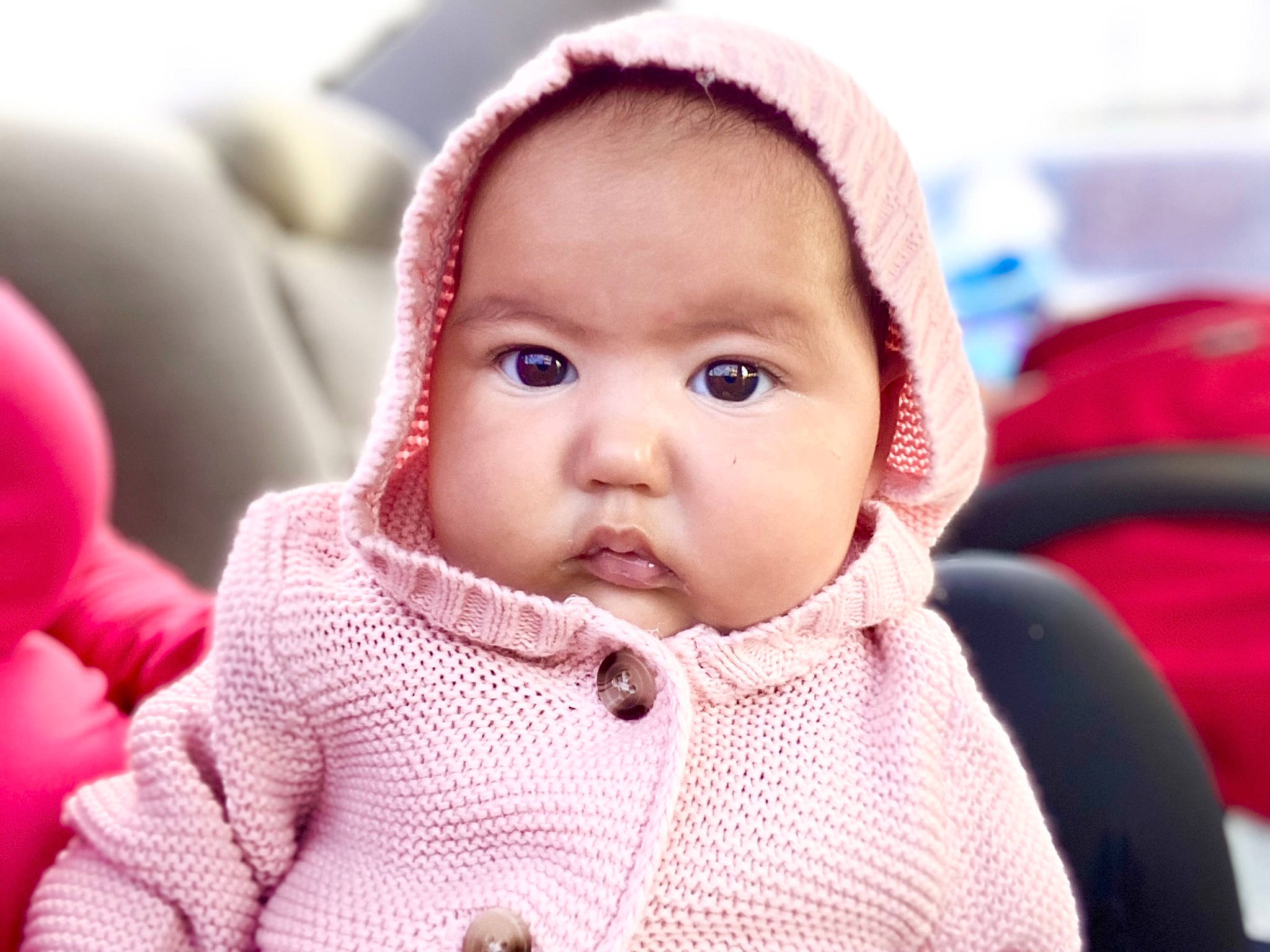 Celine is registered to the contest to win money with this photo: baby, baby_toddler_clothing, cheek, child, comfort, eye, eyebrow, eyelash, happy, head, iris, lip, mouth, nose, outerwear, person, skin, sleeve, textile, toddler