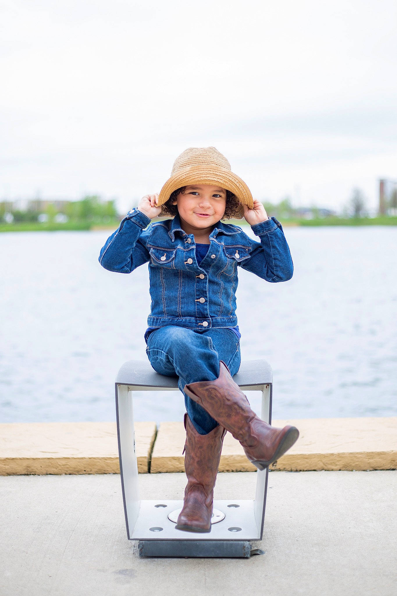Brynlee is registered to the contest to win money with this photo: blue, child, child_model, denim, footwear, happy, headwear, jeans, joy, leg, leisure, person, photo_shoot, photography, portrait_photography, recreation, shoe, sitting, standing, style
