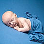 Theodore is registered to the contest to win money with this photo: baby, blanket, blue, calm, child, cute, fabric, indoors, infant, lying_down, newborn, one_person, peaceful, portrait, rest, skin, sleeping, soft, tender, wrapped